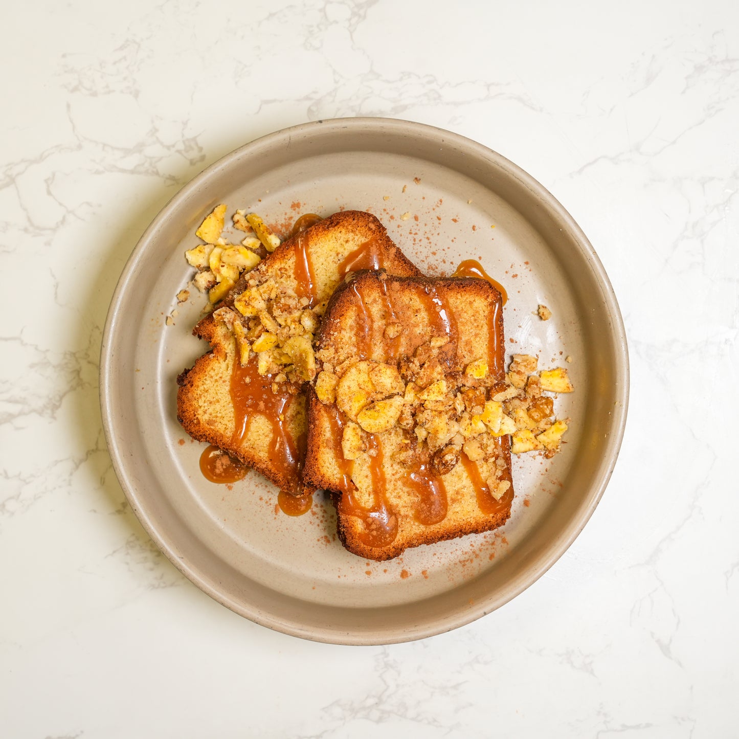 Protein Banana Bread With Chopped Walnuts - High Protein Breakfast on a beige plate against a light background