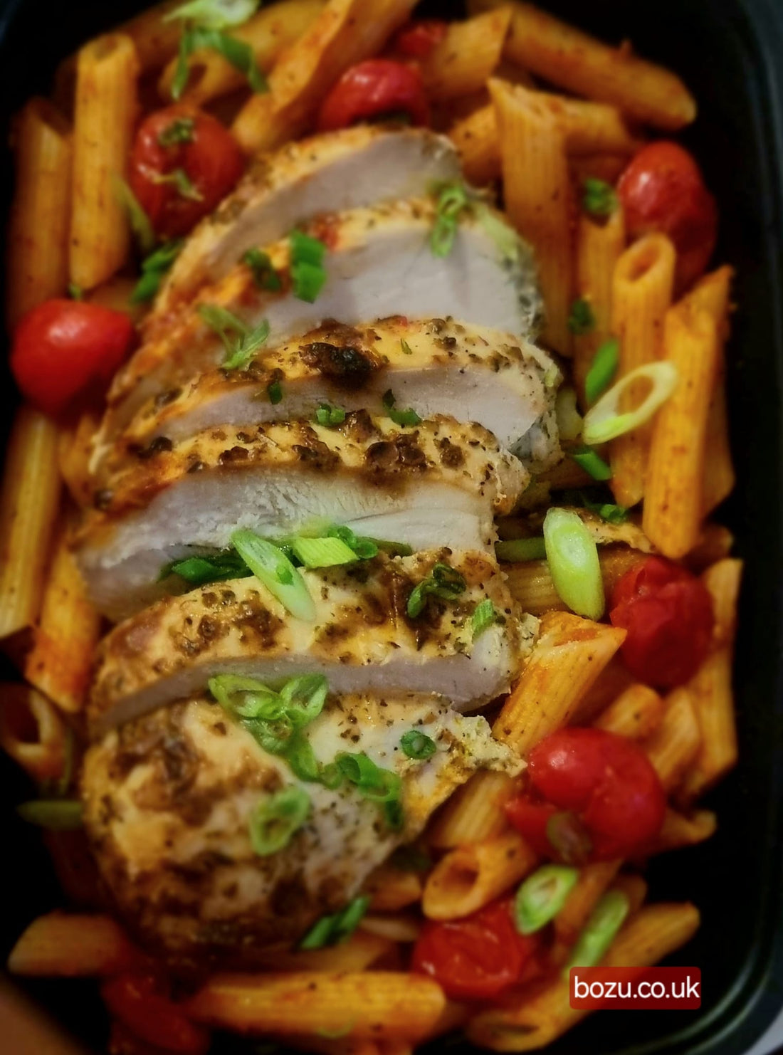 Halal chicken with pasta and cherry tomatoes ready to eat in Blackpool for weight and fat loss.