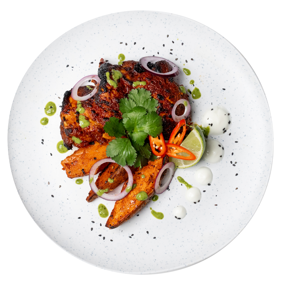 High protein chicken meal with sweet potato wedges, lime, red onion and fresh herbs – healthy ready meal delivered in the UK for weight loss and healthy eating.