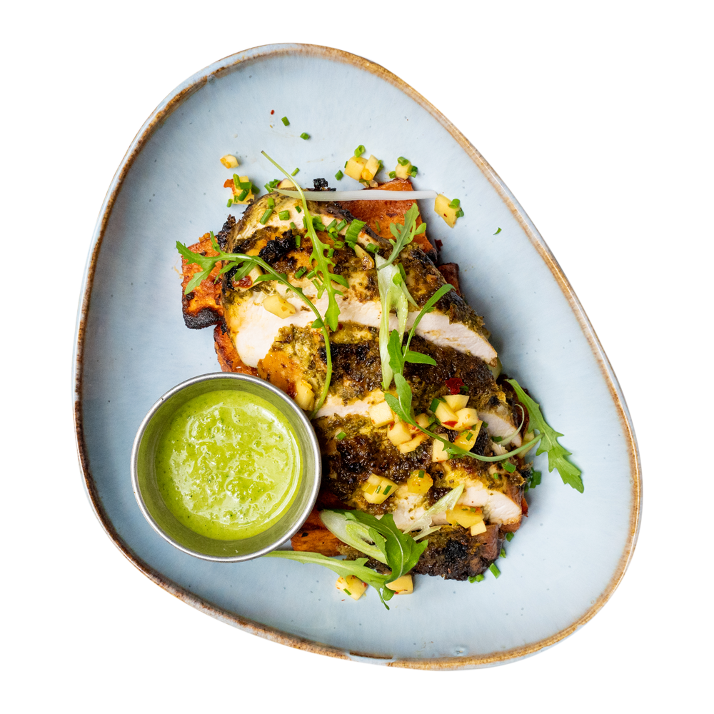 Halal Chicken meal prep with green sauce and garnish high-protein, low-carb ready-to-eat meal, delivered in Dudley for weight loss