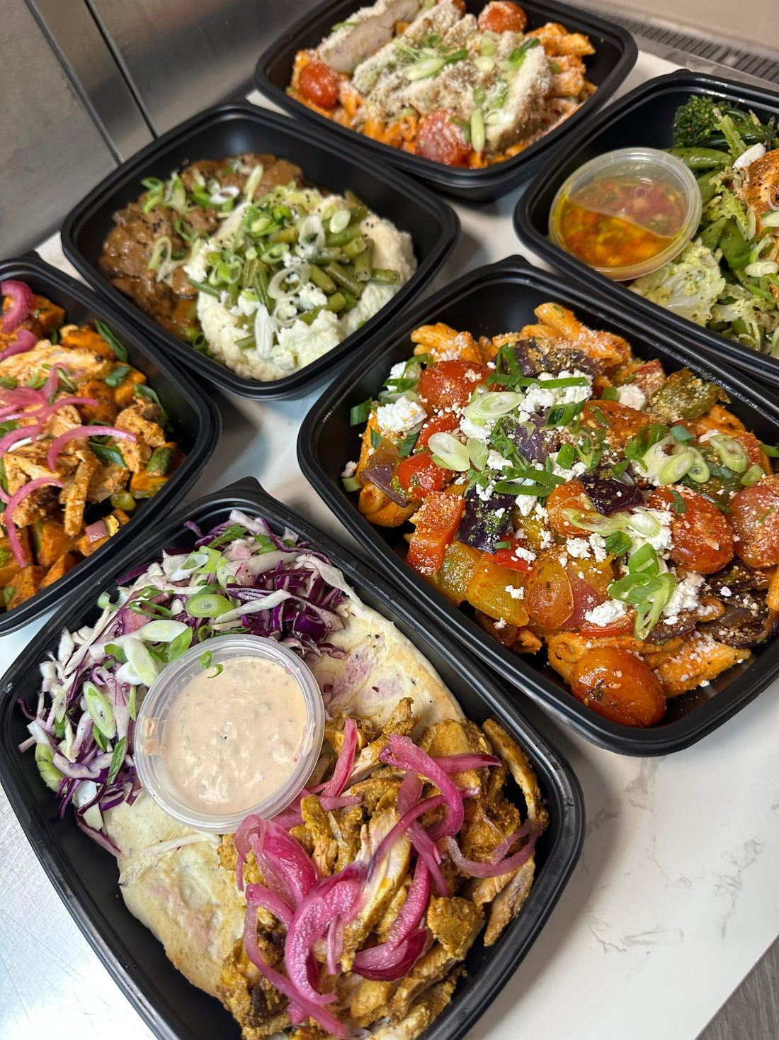 Bozu selection of halal meal prep with high-protein, low-carb ready-to-eat meals, delivered across Birmingham for weight loss