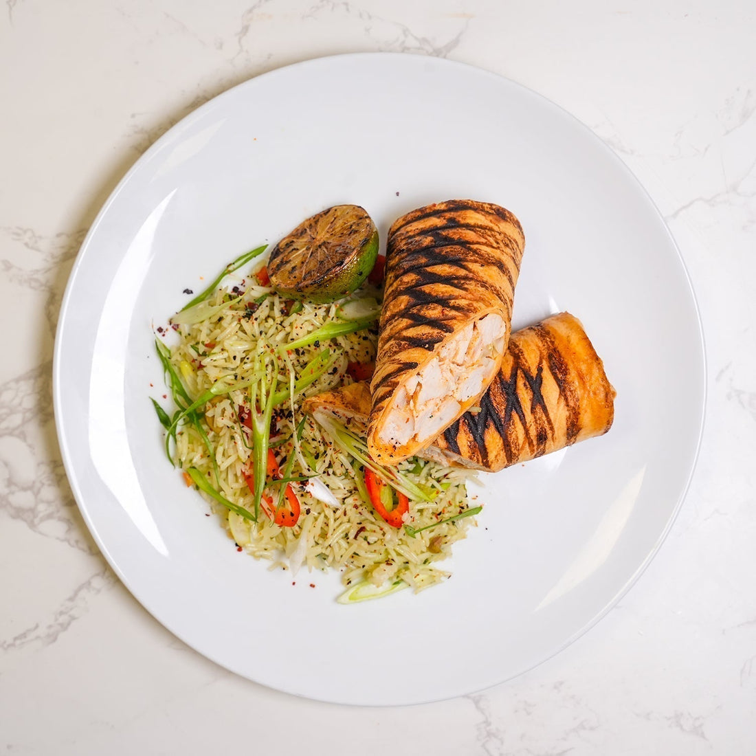 Halal Keto sweet chilli chicken wrap meal prep with rice and garnish, a healthy low-carb meal option