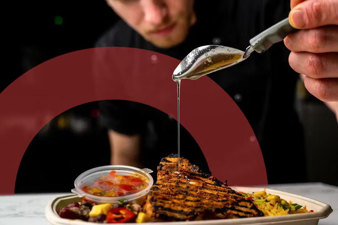 Bozu chef adding the final sauce to a freshly prepared meal prep dish saving money.