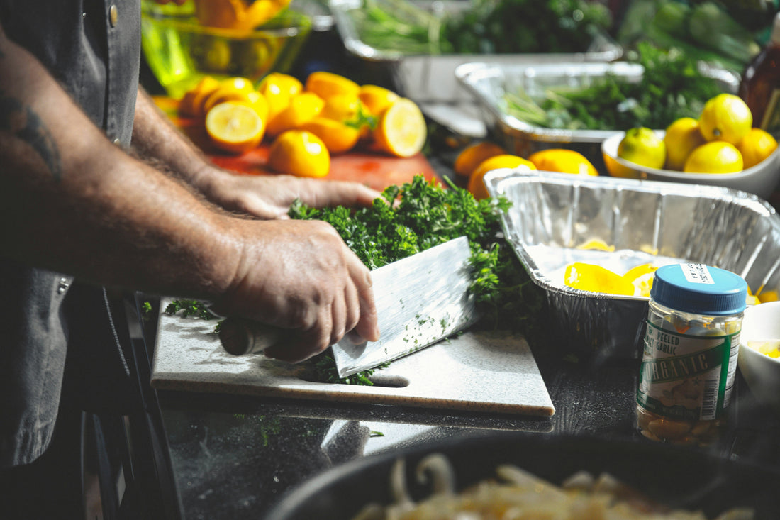 Fresh vegetables being chopped for healthy Bozu meal prep, showcasing locally sourced farm-to-fork ingredient