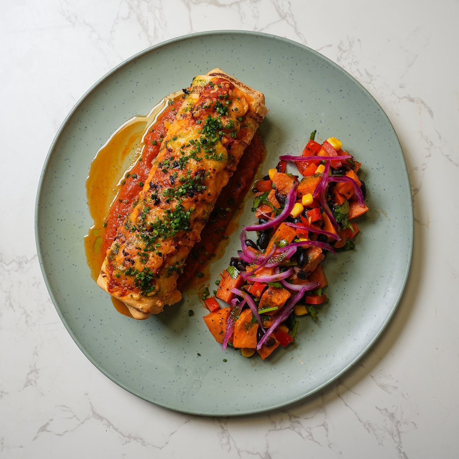 Crispy harissa tofu wrap with sweet potato and black bean salad and Bozu slaw – healthy vegetarian meal prep by Bozu UK