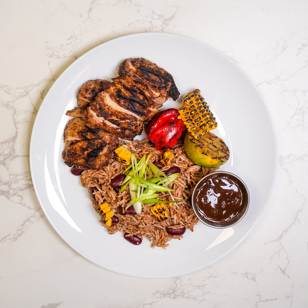 Jerk Chicken Rice & Peas Corn on the Cob marinated and grilled to perfection