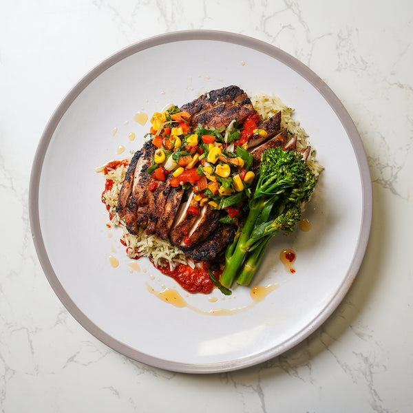 Cajun Chicken Breast, Aleppo & Coriander Rice, Charred Greens, Pineapple Salsa